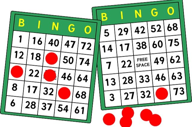 Image of two bingo boards with markers